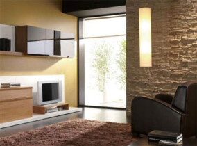 Wandgestaltung mit u.a. biegsamem Schiefer, Rindentuch, Lederoptik