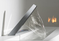 Eine skulpturale Waschtischarmatur für einen Vorhang aus Wasser