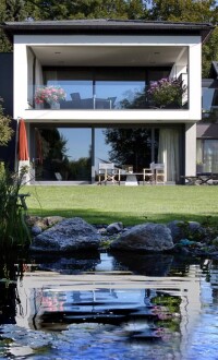 Panoramafenster mit Weitblick in Form von Aluminium-Holz-Hebe-Schiebe-Türen