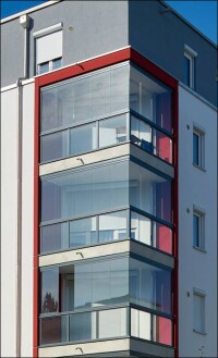 Fassadengestaltung mit „Schallschutz-Erkern“ und Balkonverglasungen