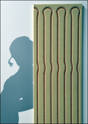 Joco kreuzt Wand- und Deckenheizung mit Holzfaserinnendämmung