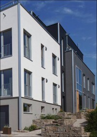 Mehrfamilienhaus à la Baufritz - selbstredend in Holzbauweise