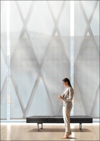 Neue LowE-Materialien für innenliegenden Sonnenschutz im Objektbau