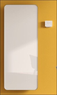 Elveo: Kermis neuer Infrarotheizkörper mit eleganter Glasfront und optionalen Bügeln