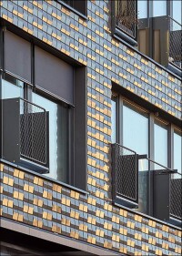 Sozialverträgliches Wohnungsbauprojekt mit kleinen Keramik-Fassadenelementen ganz groß auf WDVS