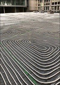 Revitalisierung des Helaba-Bürohauses mit einem neuen, flächentemperierten Innenhof