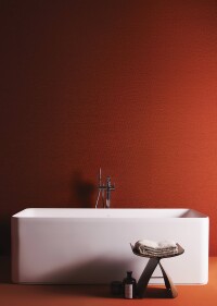 Zu Ideal Standards Conca-Waschtischen gesellen sich passende Möbel, eine Wanne, WCs und Bidets