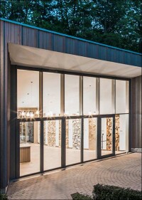 Funktional und emotional wirkungsvoll: Glas-Faltwand im UNESCO Geopark Bad Iburg