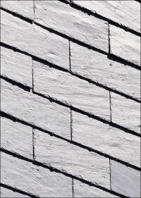 Horizontale Deckung: Edler Schiefer trifft auf preiswerte Deckungsweise