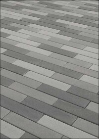 Nimbus: Neues Betonsteinpflaster von KANN für eine lebendige Flächengestaltung mit Grautönen