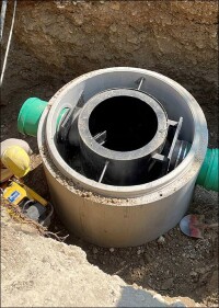 Dezentrale Regenabwasserbehandlung für Flusseinleitung via Sedimentationsanlage