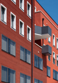 Mix im Mix: Wohn- und Geschäftshaus Gare du Nord in Freiburg mit StoTherm Cell und Kammputz-Struktur