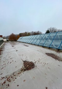 Seit 25 Jahren Anschlussabdichtung von Triflex am Dach eines Autohauses