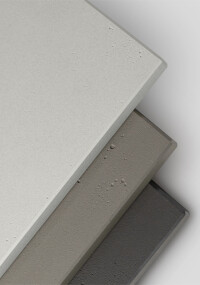 Rauvisio cube von Rehau: Verpresste Großformatplatte mit MDF-Kern in Beton-Optik