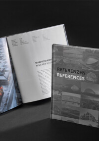 Kalzip fasst 55 Projekte aus 55 Jahren in einem Referenzbuch zusammen