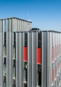 Projekt Batpol: Individuelle Lochblechfassade für Aufstockung der Feuerwehrhalle