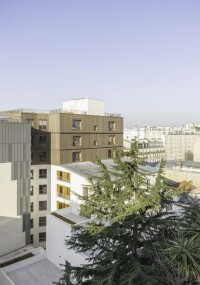 Parkhaus wird Wohnraum: Umbau und Holzaufstockung an der Avenue Parmentier in Paris