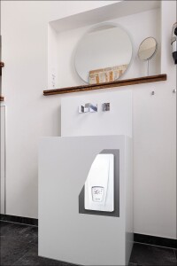 Warmwasser nach Maß im Denkmal: Historisches Hotel meistert Stoßzeiten mit dezentraler Technik