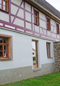Historisches Wohnstallhaus mit UdiIN Reco Innendämmung zu Tierarztpraxis transformiert
